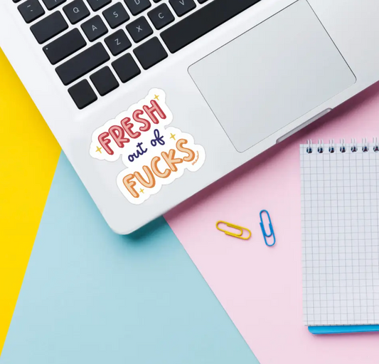 Fresh out of fucks vinyl sticker on laptop