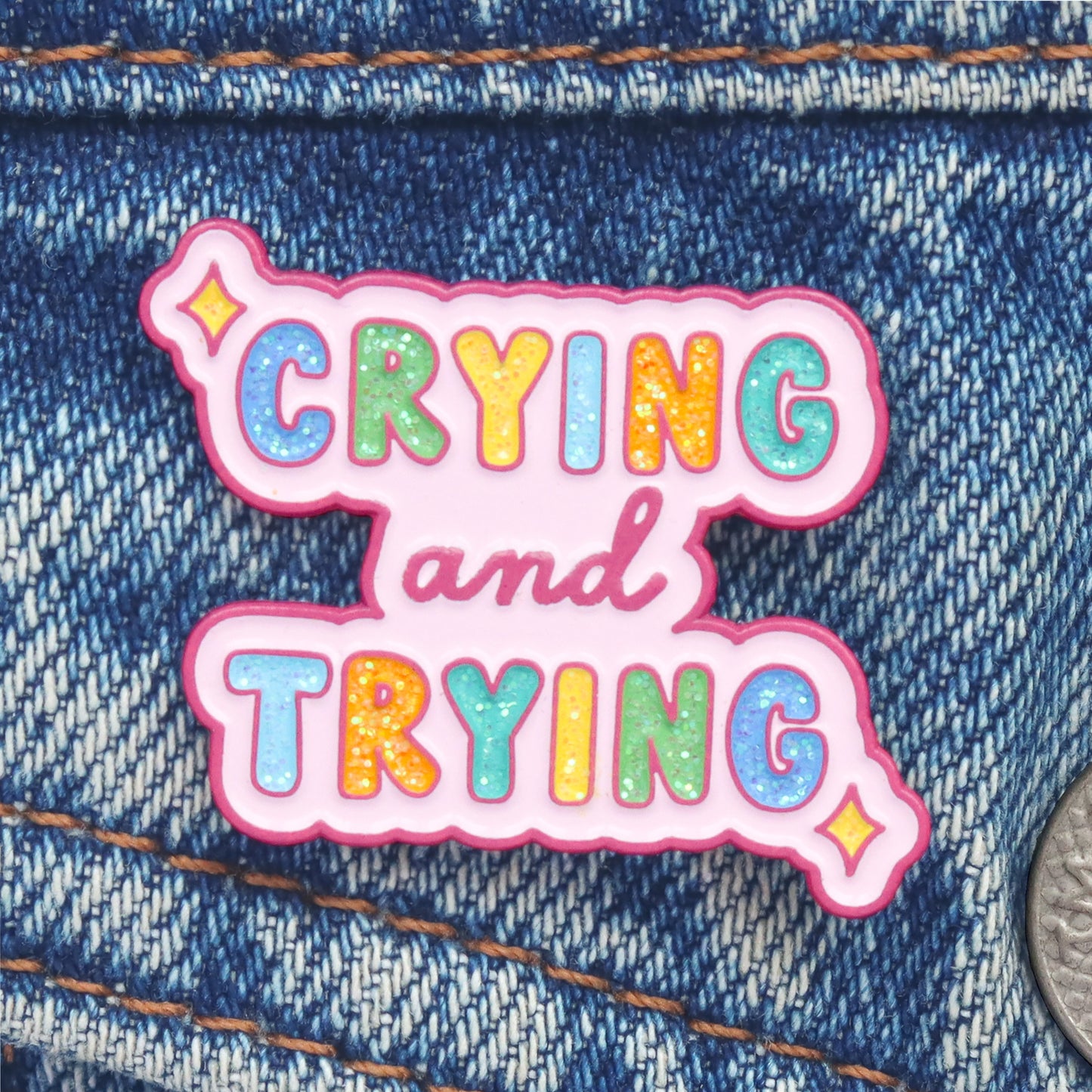 Crying and trying enamel pin