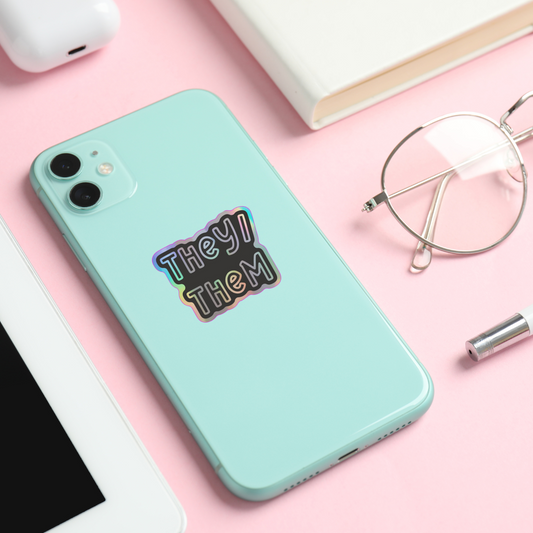 They/them holographic vinyl sticker on phone