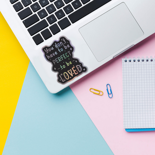 books are magic holographic vinyl sticker on laptop