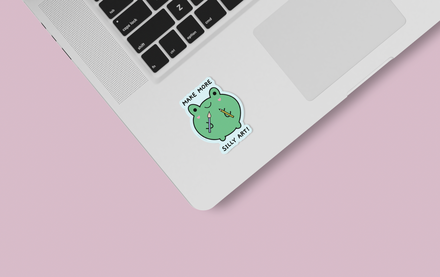 make art frog sticker on laptop