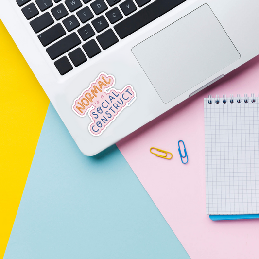 normal is a social construct vinyl sticker on laptop