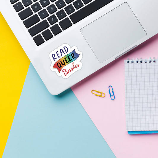 read queer books vinyl sticker on laptop