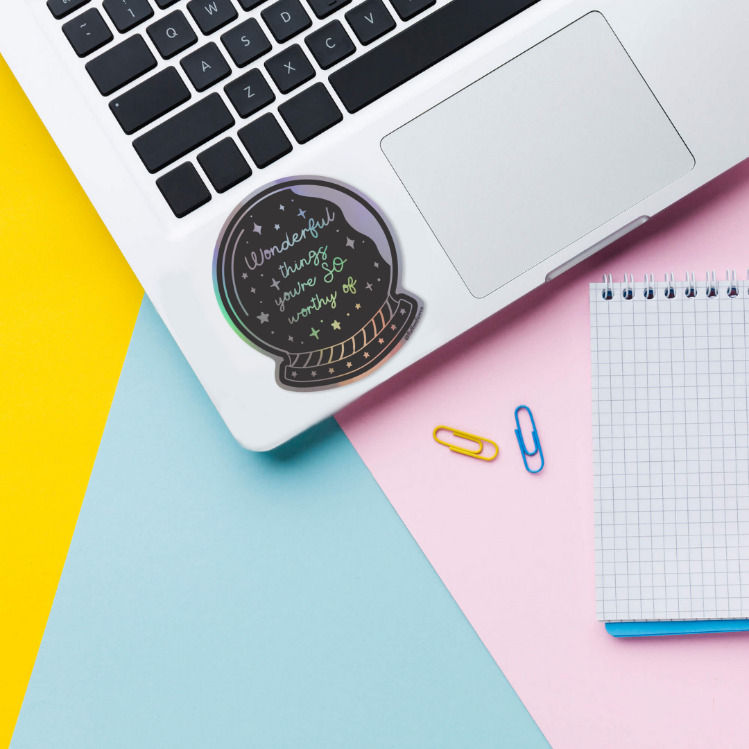 wonderful things holographic vinyl sticker on laptop