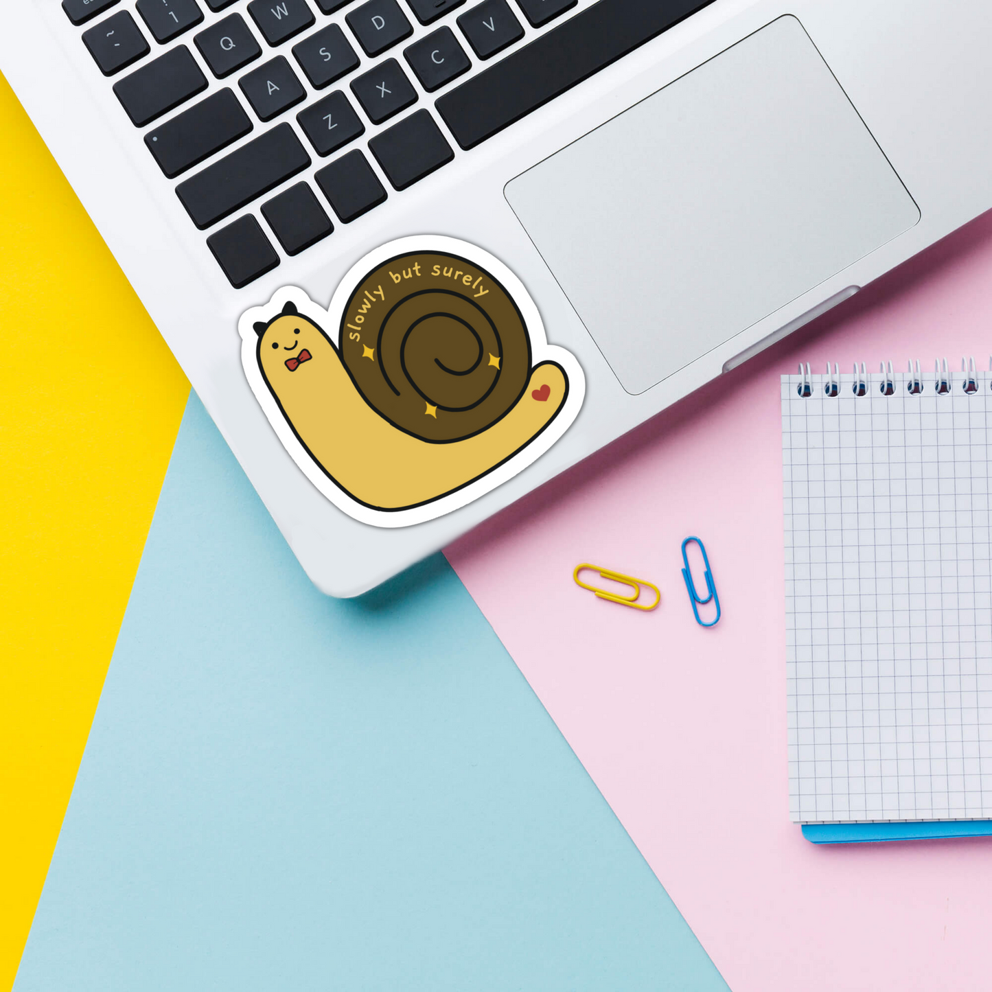 Snail_slowly_but_surely vinyl sticker on laptop