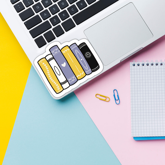 non binary book stack vinyl sticker on laptop