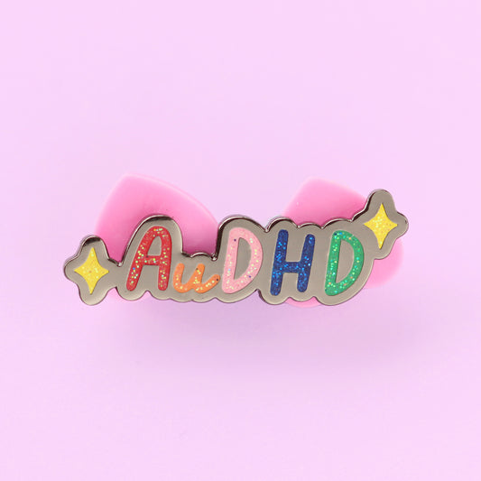 AuDHD autistic + ADHD glitter enamel pin