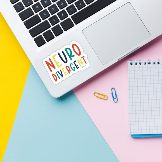 Neurodivergent rainbow sticker on laptop