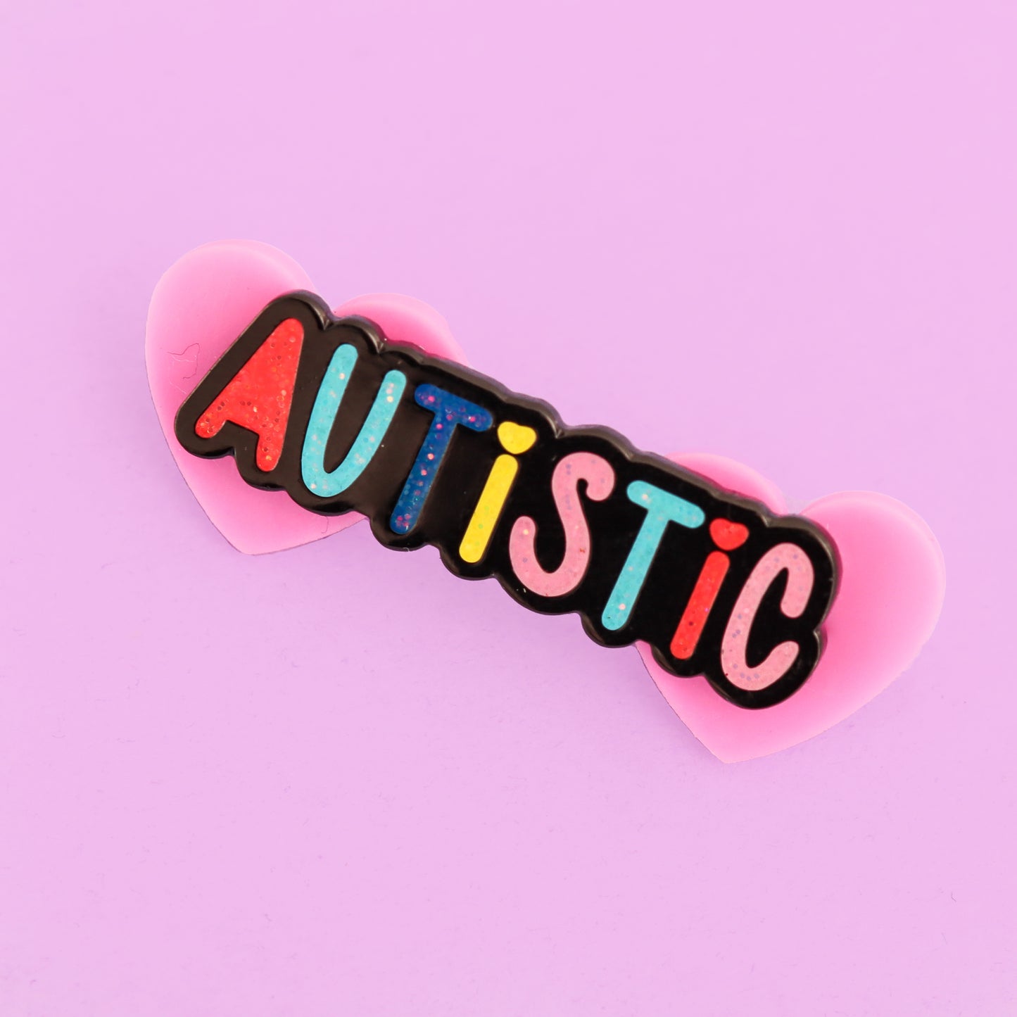 Autistic enamel pin