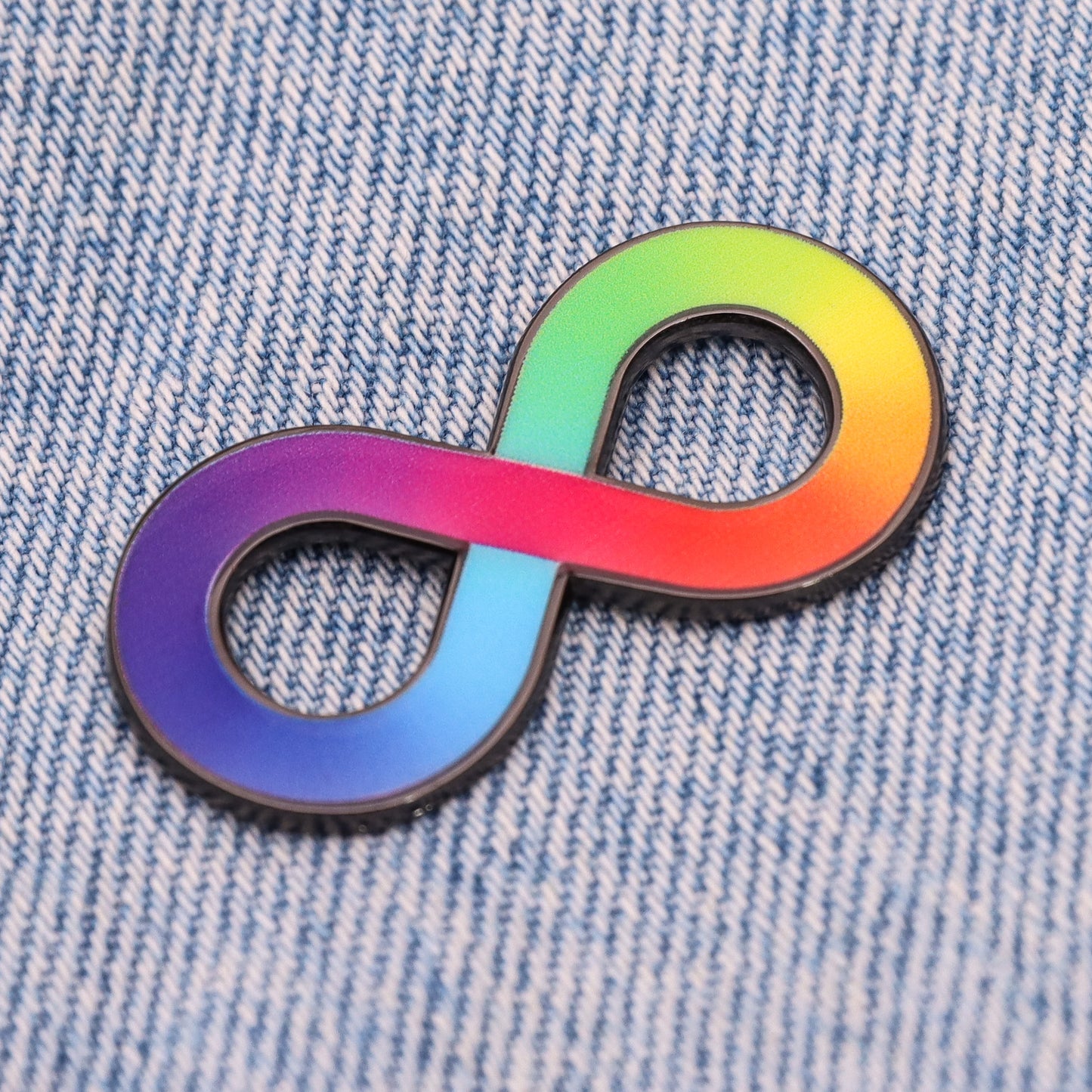 Rainbow infinity neurodivergent enamel pin