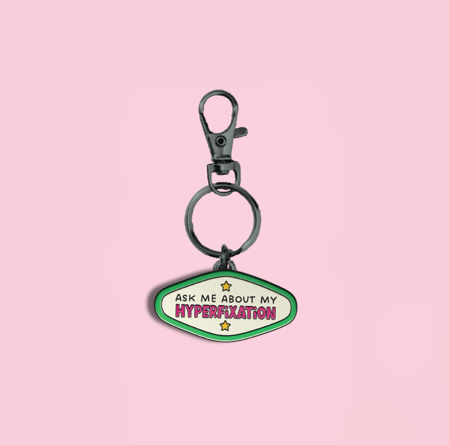 Ask me about my hyperfixation enamel keychain and bag charm