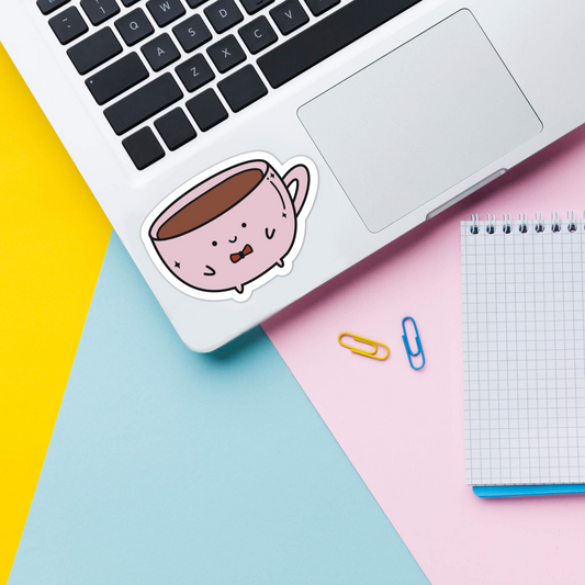 coffee mug sticker on laptop 