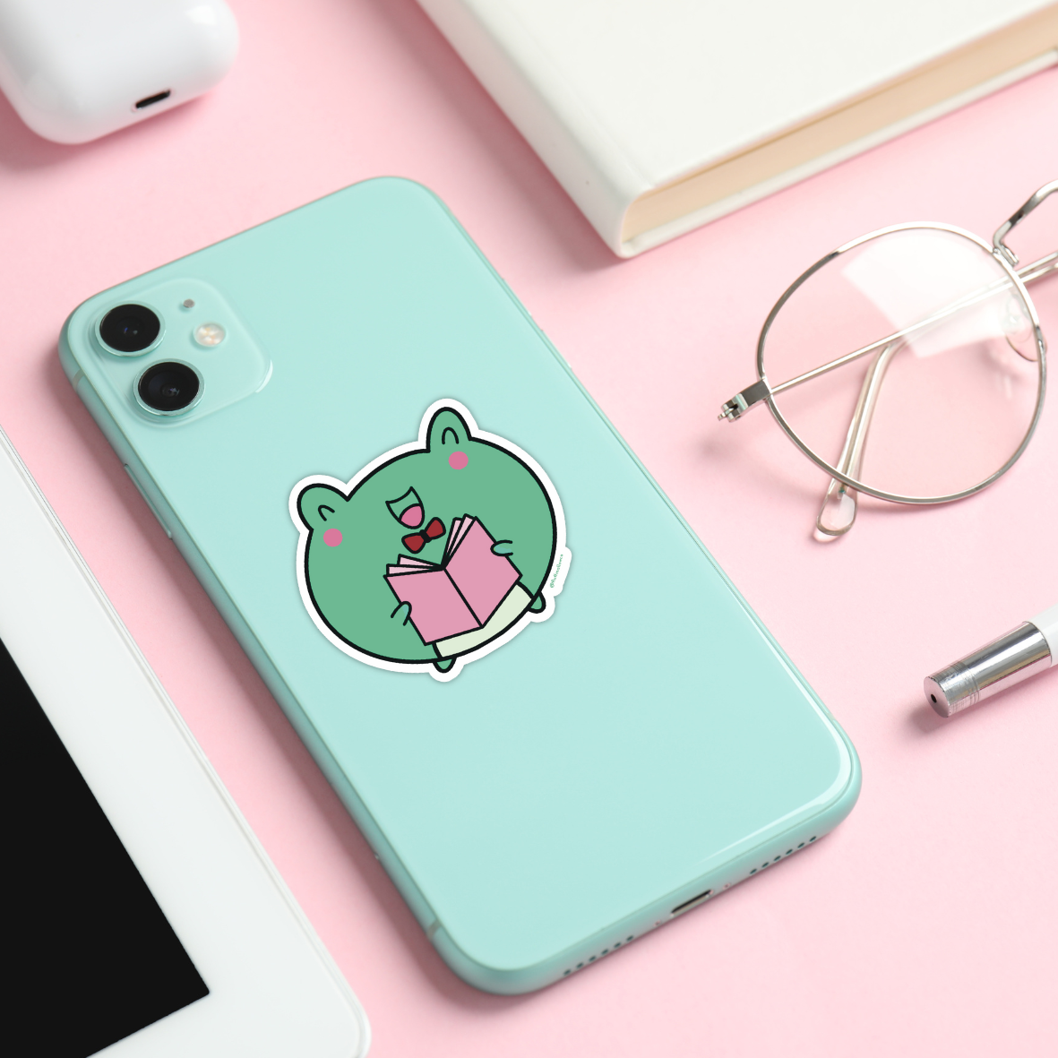 frog reading sticker on phone