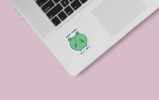make art frog sticker on laptop 